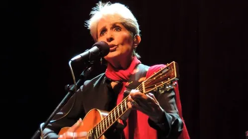 
				
					Joan Baez pegou nas minhas mãos, e eu estava de joelhos diante dela
				
				